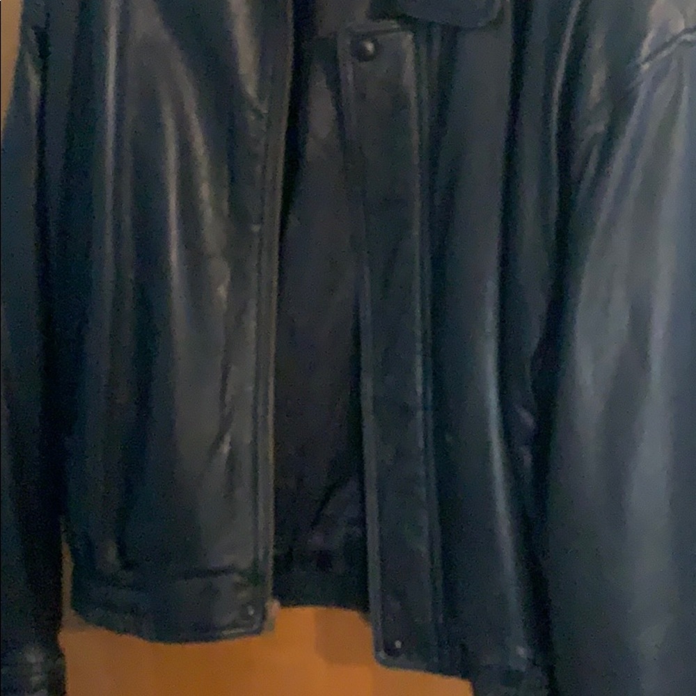 Men’s black leather jacket.
